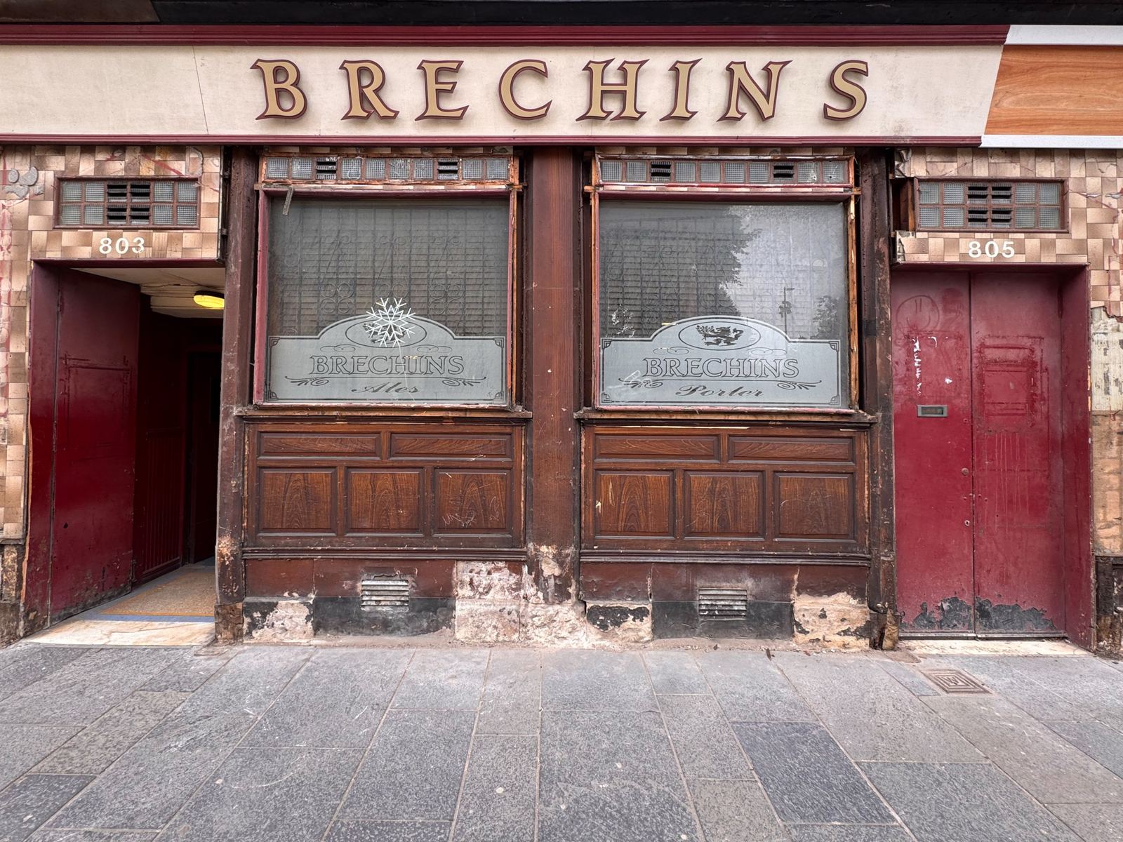The Brechin's Bar frontage at 803 Govan Road, with the Victorian timber shopfront uncovered beneath the modern fascia